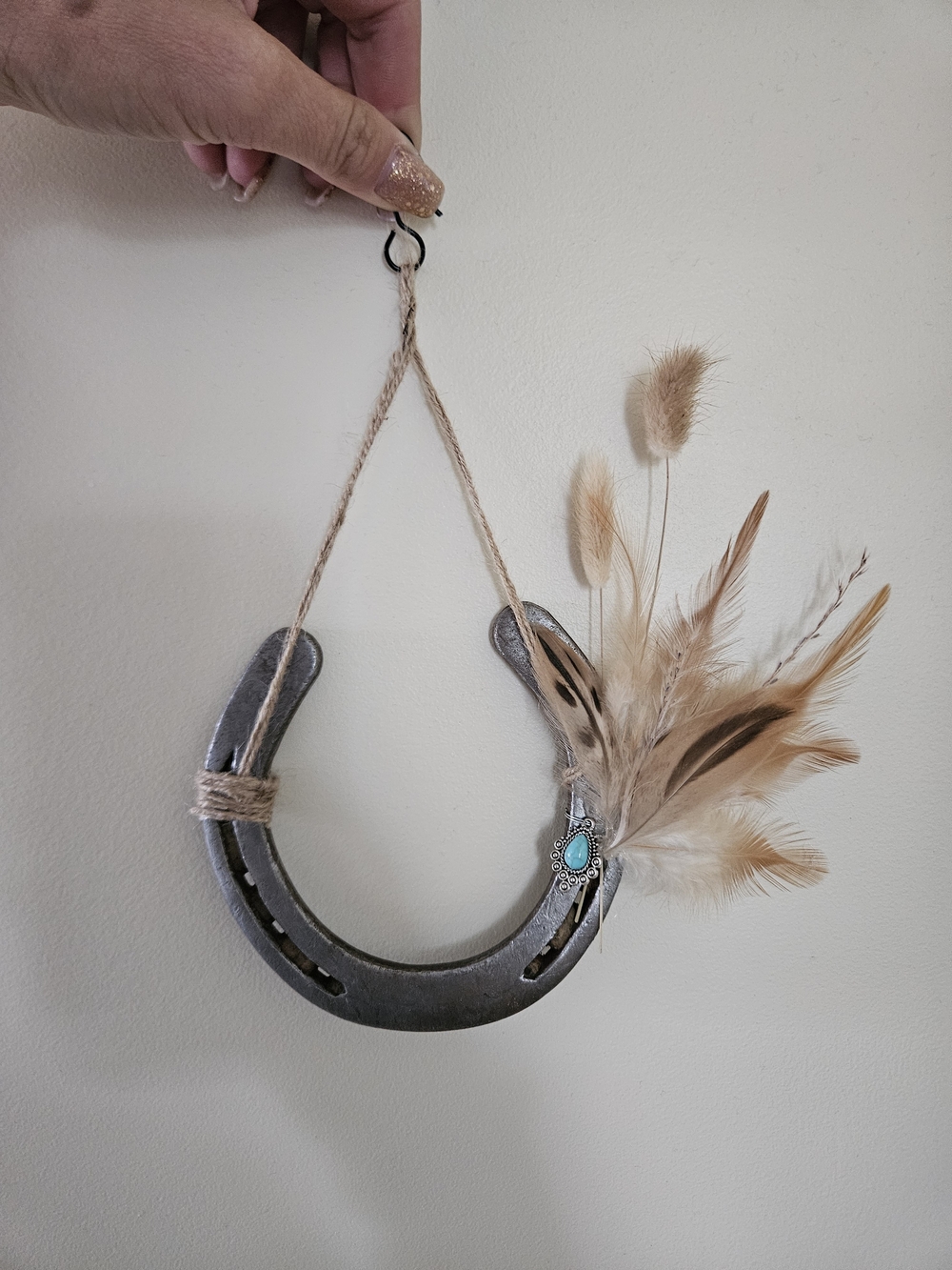 Rustic Silver Horseshoe Wall Hanging with Natural Feathers